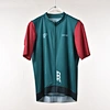 green cycling shirt